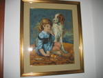 si tratta di una tela di 50 x 70 cm che ritrae una bambina accovacciata vicino ad un setter inglese